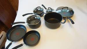 lot 131 image: T-Fal pots and pans