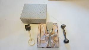 lot 148 image: Vintage sterling silver baby accessory rattle, brush and teething toy engraved David sterling silver styled by SAART