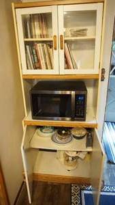 lot 168 image: Sharp carousel microwave oven, cabinet and contents of cabinet, Cookbooks etc.