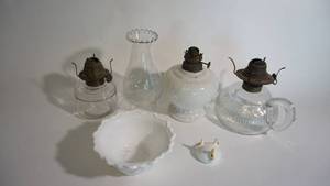 lot 180 image: Set of three hurricane oil lamps with the tallest finger base being 5 inches, includes milk glass bowl, hurricane blown lampshade thats so cool yeah
