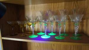 lot 197 image: Antique Tiffin Elegant Swirl Etched Glass Wine Glass with Twist Stem, Uranium Glass Details, 1920-30s Uranium base Crystal 6 12 inch and 8 inch stemware, and four etched glass and yellow stemware