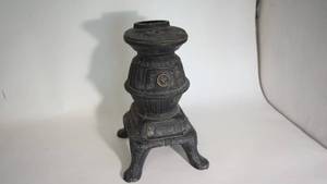 lot 215 image: Cast iron lamp base potbelly stove 12 inches tall
