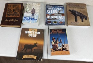 lot 90 image: Collection of Hunting and Gun Books The Blue Book of Gun Values, Lure of the Open, Whitetail Deer and More