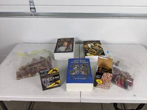 lot 127 image: Assortment of Fiocchi, Federal, and Unknown Ammunition and Gun Books