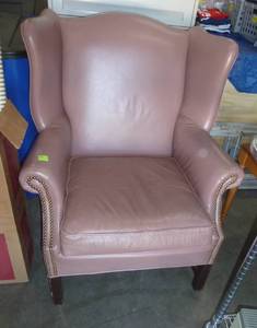 Rose colored leather chair