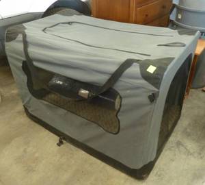 Nice portable dog house 48L x 27w x 31 tall, with brand new bed