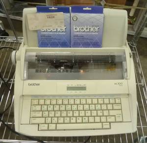Brother ML300 typewriter with 2 correcting ribbons