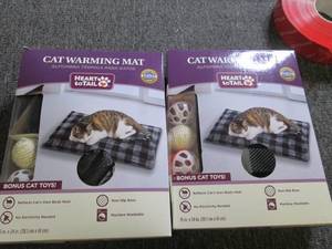 lot 72 image: 2 heart to tail cat warming mats ...