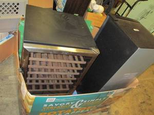 lot 102 image: 1 small refrigerator and 1 wine coo...