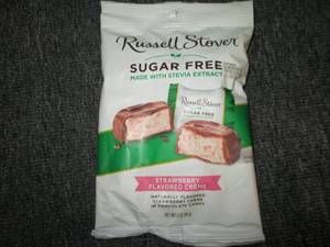 lot 128 image: 83 oz baggs fo russel stover sugar...