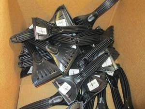 lot 227 image: 33 new ice scrapers...