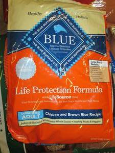 lot 344 image: 15lb of blue chicken and brown rice...
