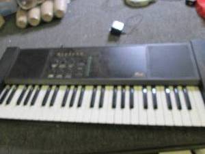 lot 415 image: the mirage piano teaching system po...