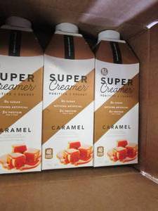 lot 439 image: box of desk pads, tea, super creame...