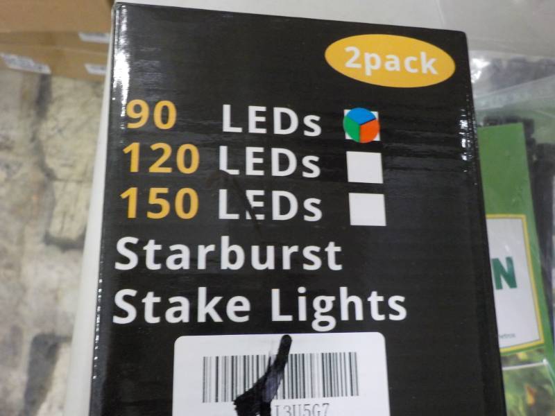 lot 216 image: LED Starburst Stake Lights, Garden ...