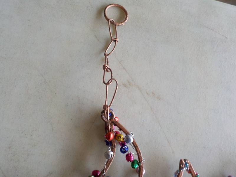 lot 27 image: Sun Chime hanging 18 x 23...