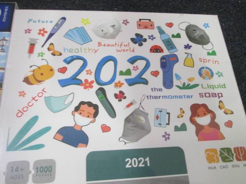 lot 64 image: 2- 1000 pc Puzzles...