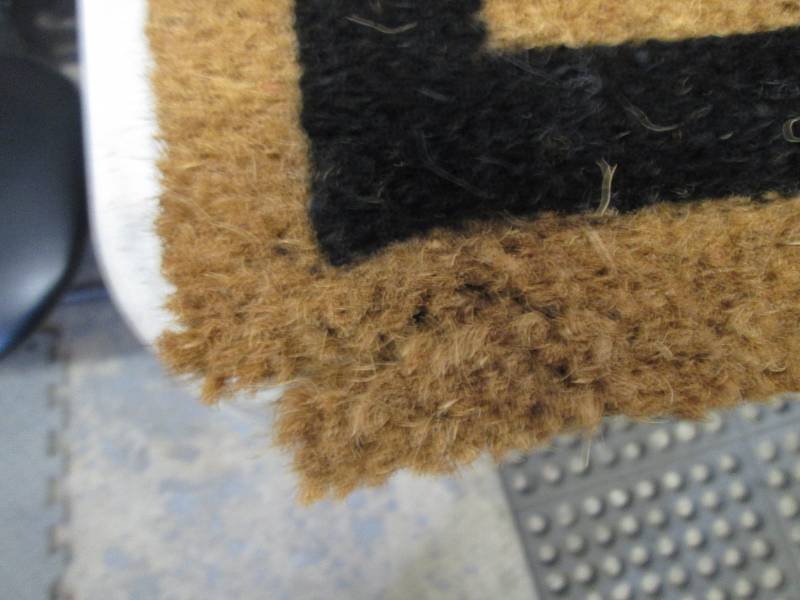 lot 90 image: Home Welcome Mat- sl corner damage...
