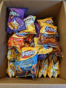 lot 502 image: Box with 32 baked Ruffles Cheddar a...