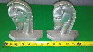 lot 116 image: Solid Pewter Book ends or doorstops.
