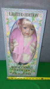 lot 118 image: Porcelain Doll - New in Box