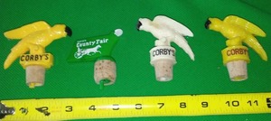 lot 127 image: (4) VINTAGE CORBYS LIQUOR BOTTLE STOPPER POUR SPOUT CORK
