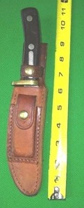 lot 150 image: Old Timer knife & leather sheath.