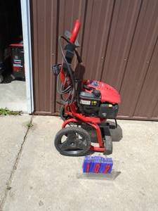 lot 102 image: Troy Bilt 6.75 pressure washer. 2500 psi. Motor tested. Issue with pump. Used condition. As shown.