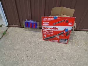 lot 106 image: Homelite 2 cycle blower in box. Looks nearly new. Tested & works. As shown.