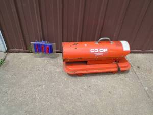 lot 108 image: Co-Op kerosene heater. Approx 80000 btu. Full of kerosene. Tested & works. As shown.