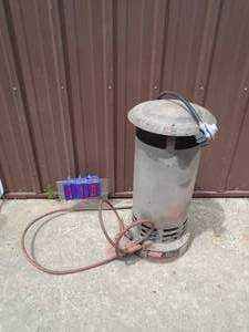 lot 110 image: Coleman construction heater. Used condition. As shown.