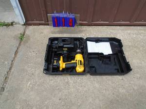 lot 114 image: Dewalt 14.4 volt drill , charger, battery & case. As shown.