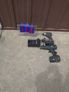 lot 118 image: Misc drills. Both works. As shown. Batteries weak.
