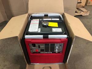 lot 31 image: Honda 2800-Watt Recoil Start Gasoline Powered Industrial Full GFCI Protection Inverter Generator - Open Box - Review all pictures