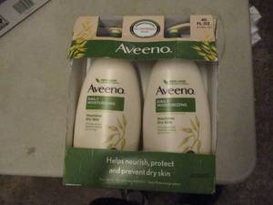 2 bottles of Aveeno Daily Moisturiz...