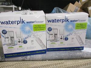 2 Waterpik Water Flosser Sets- used...
