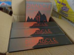 Box of 4 Pinnacle Stacking Games...