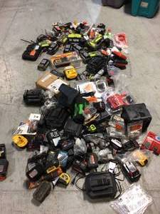 lot 11 image: Lot of mixed batteries and chargers Customer Returns See Pictures 