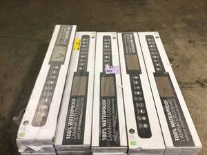 lot 33 image: A&ampA Surfaces Trinity Mocha Waterproof Laminate Wood Flooring 10 mm T x 7.7 in. W x 47.87 in. L (17.96 sq. ft.case) 11 cases Customer Returns See Pictures