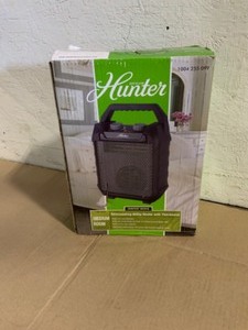 lot 6 image: Hunter Deluxe Recirculating 1,500-Watt Utility Space Heater with Adjustable Thermostat. See Pictures