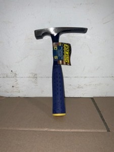 lot 20 image: Estwing 20 oz. Solid Steel Bricklayer with Blue Vinyl Shock Reduction Grip and Patented End Cap. See Pictures