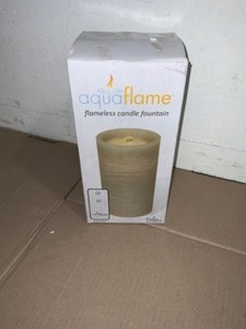 lot 27 image: Aquaflame Sand Battery Operated Pillar Candle with Water Fountain. See Pictures