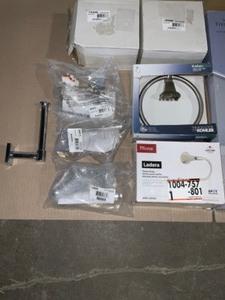 lot 40 image: Various Brands & Conditions of Towel Bars, Toilet Paper RingsHolders & Shower Rod. See Pictures