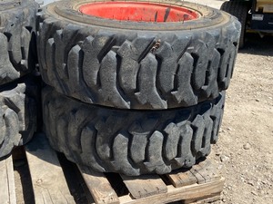 lot 8 image: Set Of (4) Skid Loader Wheels & Tires