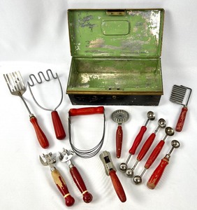 lot 42 image: An Assortment of Antique Red Wood-Handled Kitchen Utensils in a Vintage Metal Box