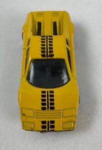lot 136 image: Lot of Four 164 Yellow Toy Cars