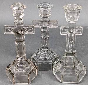 lot 124 image: Three Vintage Glass Standing Crucifix Candle Holders