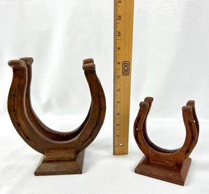 lot 85 image: Three Vintage Hand-Crafted Wooden Horseshoe Napkin Holders