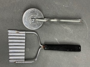 lot 148 image: A Bevy of Antique Stainless Kitchen Tools including Sunkist Lemon Press