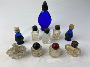 lot 317 image: Vintage Collection of 10 Tiny Perfume Bottles - Evening in Paris, Wind Song, and More
